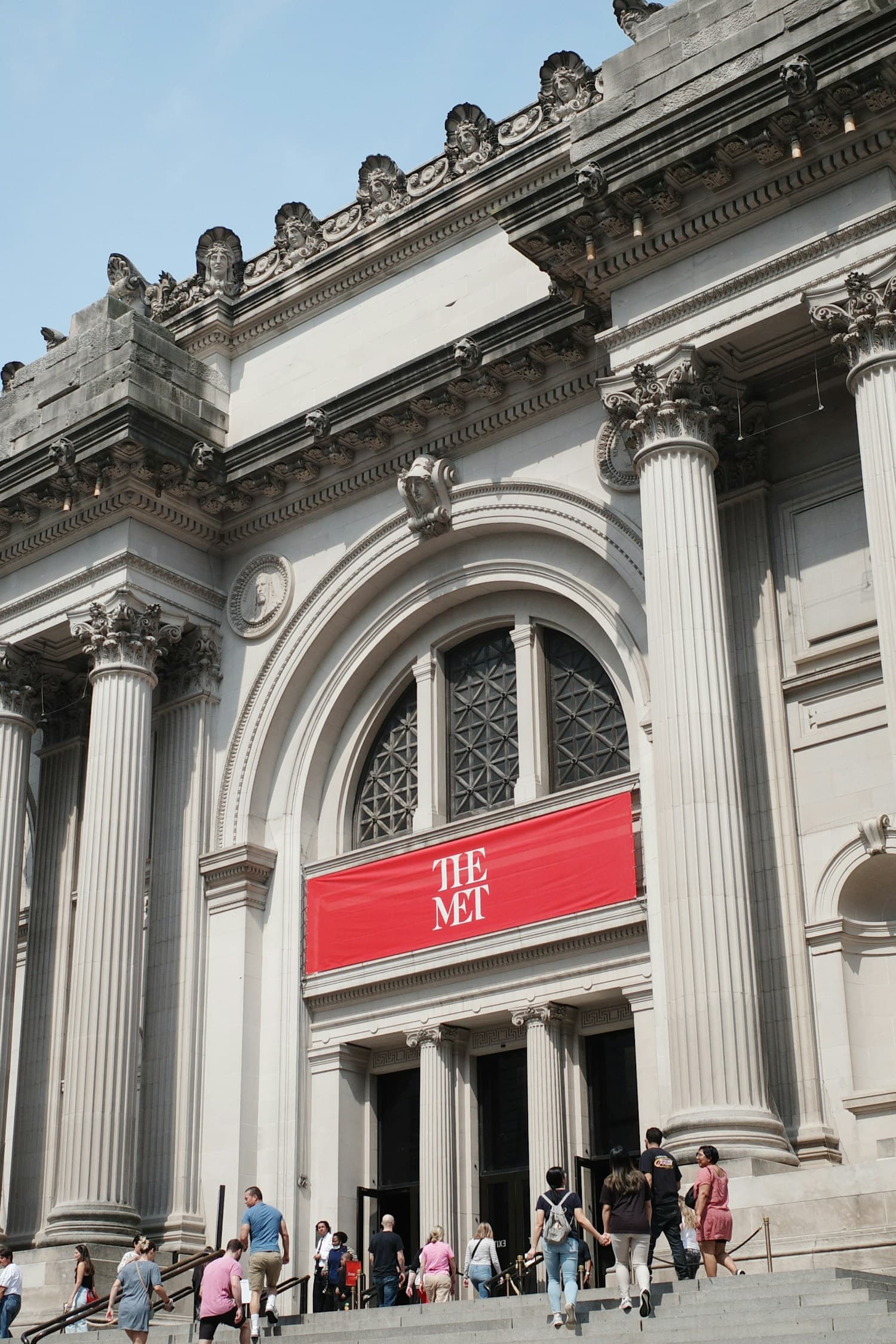 The Metropolitan Museum of Art: the central entrance bay, with the uncarved stone blocks over the paired columns