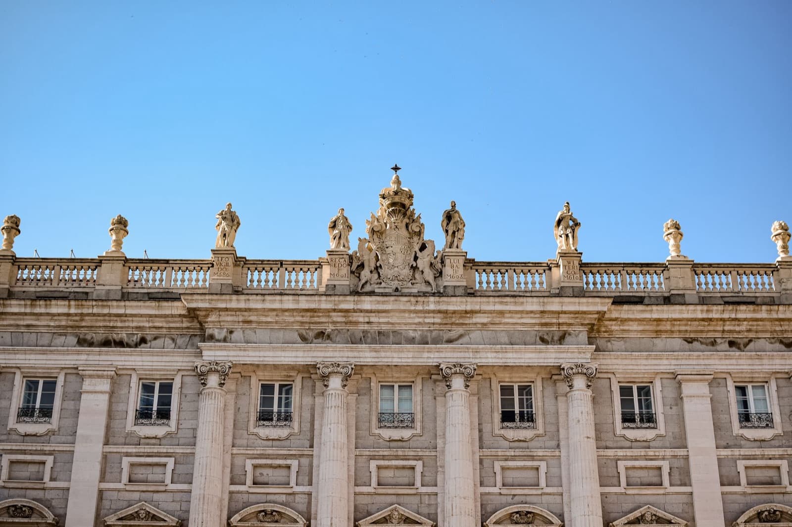 Royal Palace of Madrid: the statues and balustrade along the top of the palace