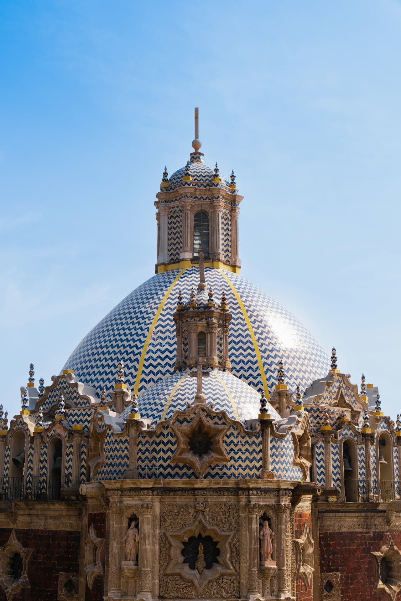 Capilla del Pocito: Red Stone Under Tiled Domes