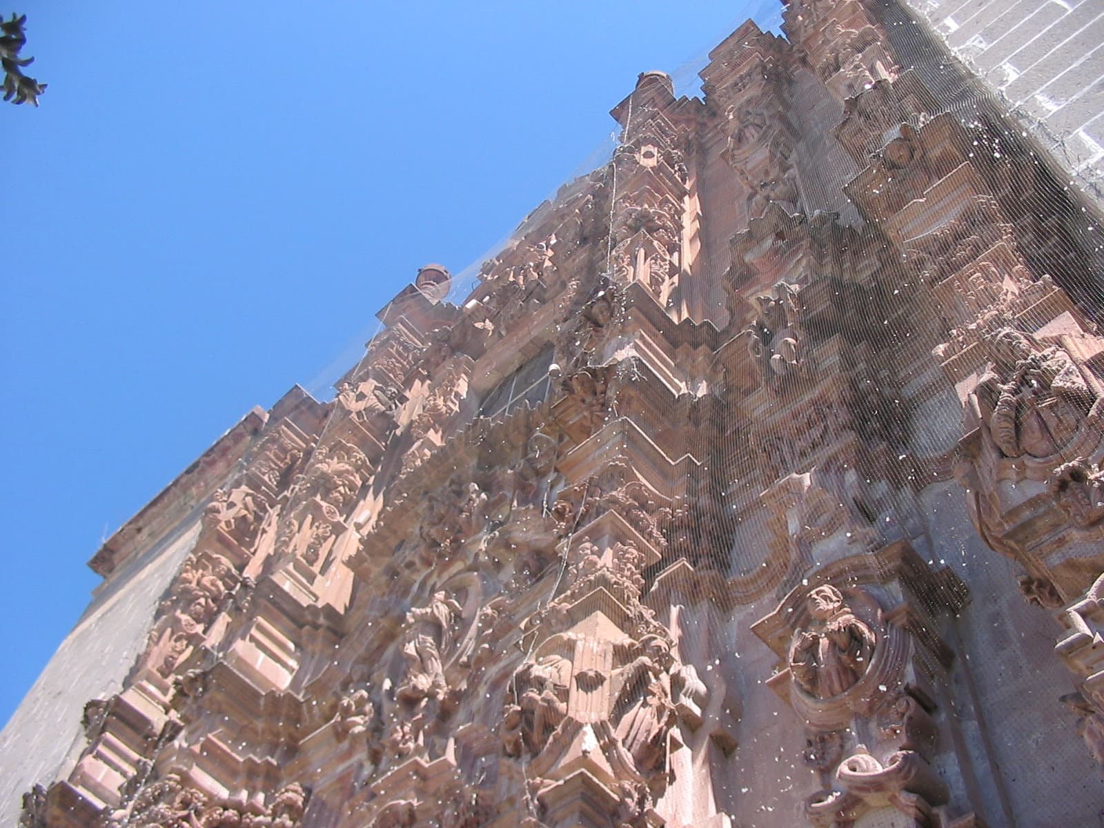 San Francisco: A Carved Front Beside a Plain Chapel