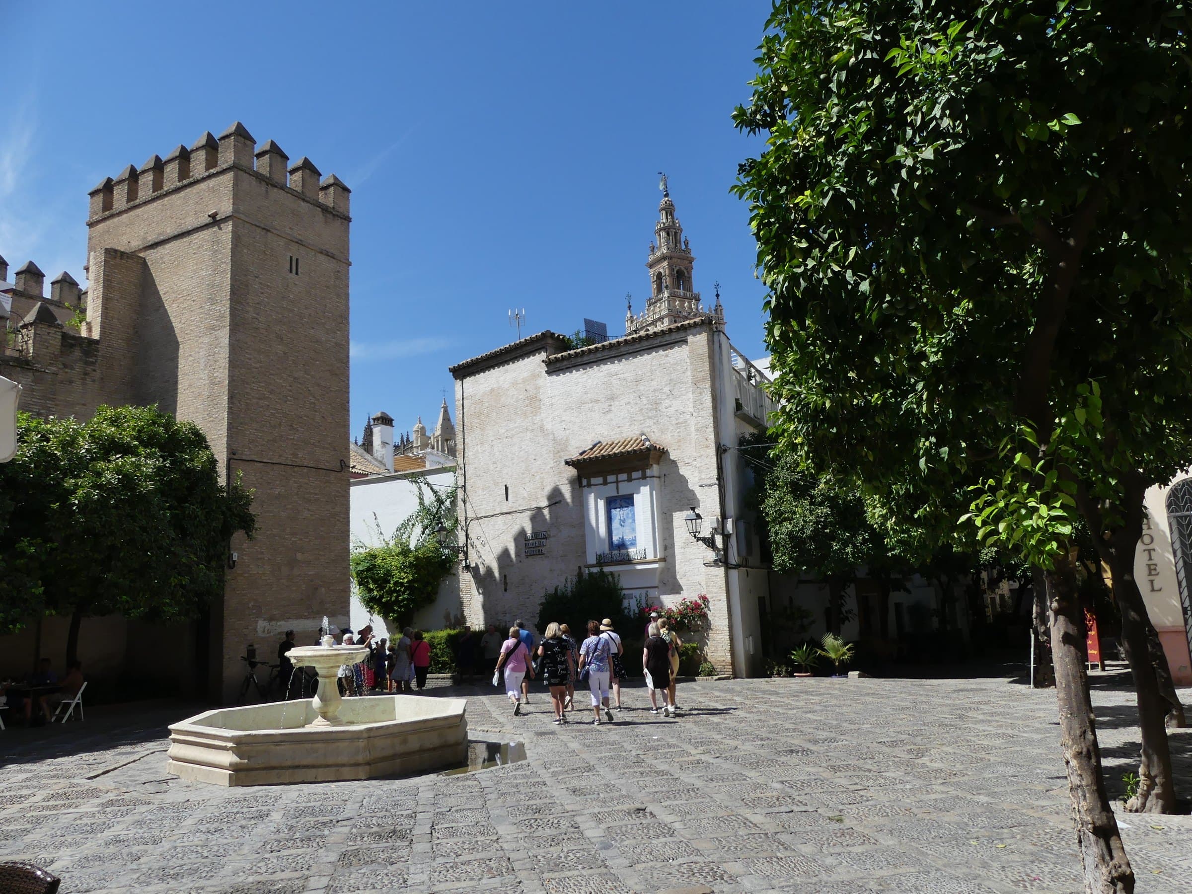 Plaza de la Alianza: A Medieval Wall with a 1960s View