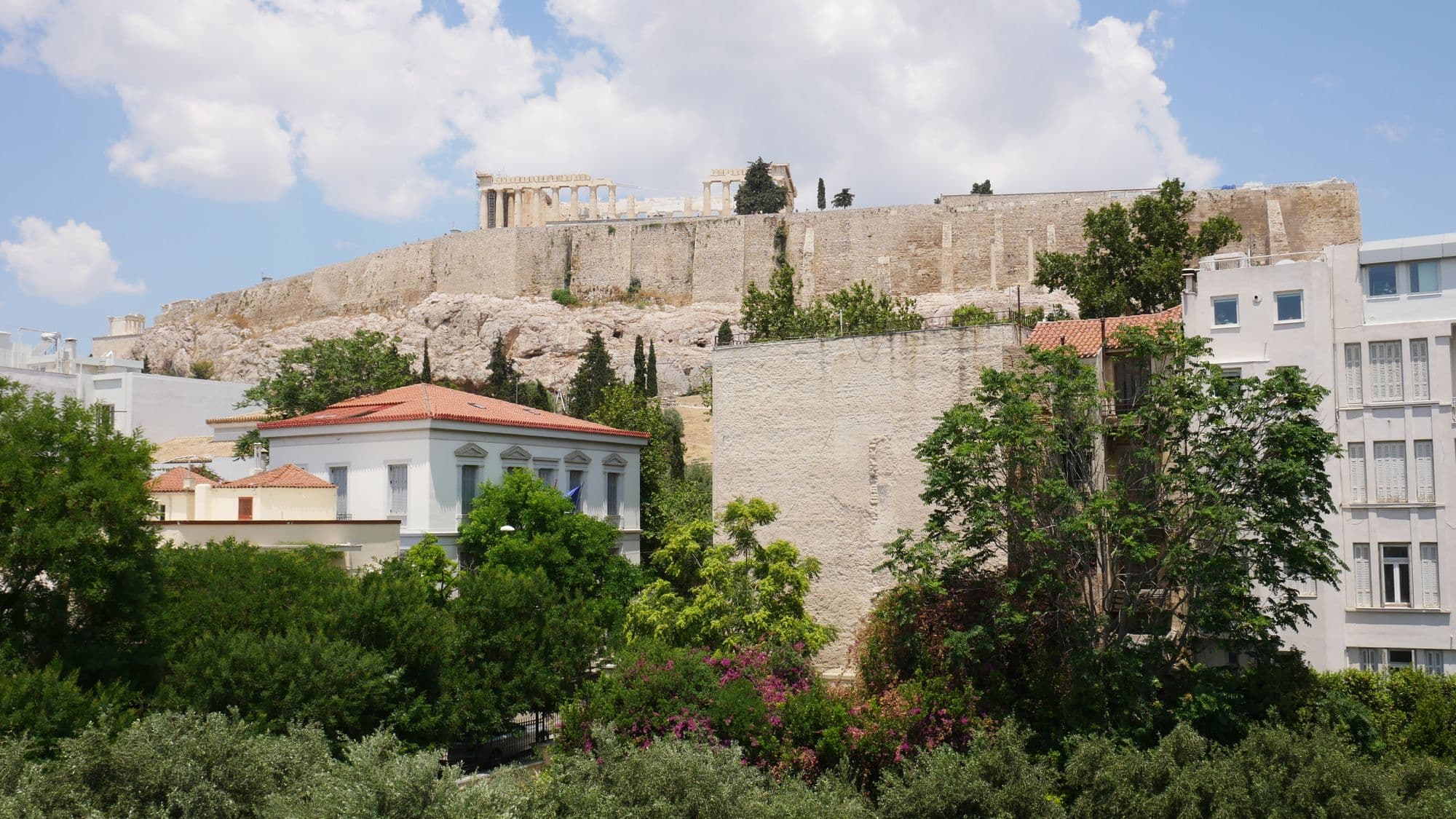 Acropolis Museum: the Acropolis above the neoclassical houses to its south