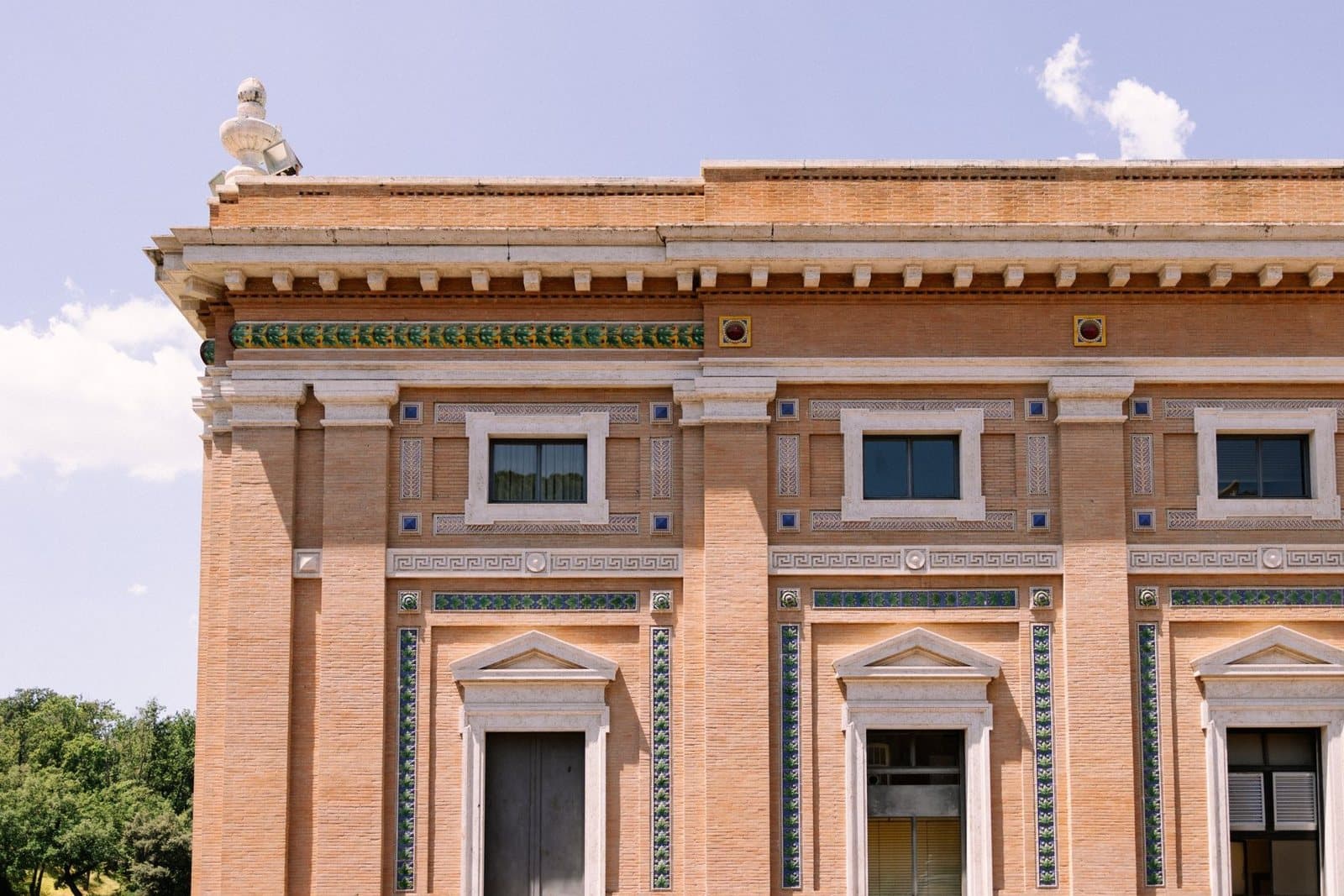 Vatican Museums: brick pilasters and maiolica bands on the Pinacoteca's front