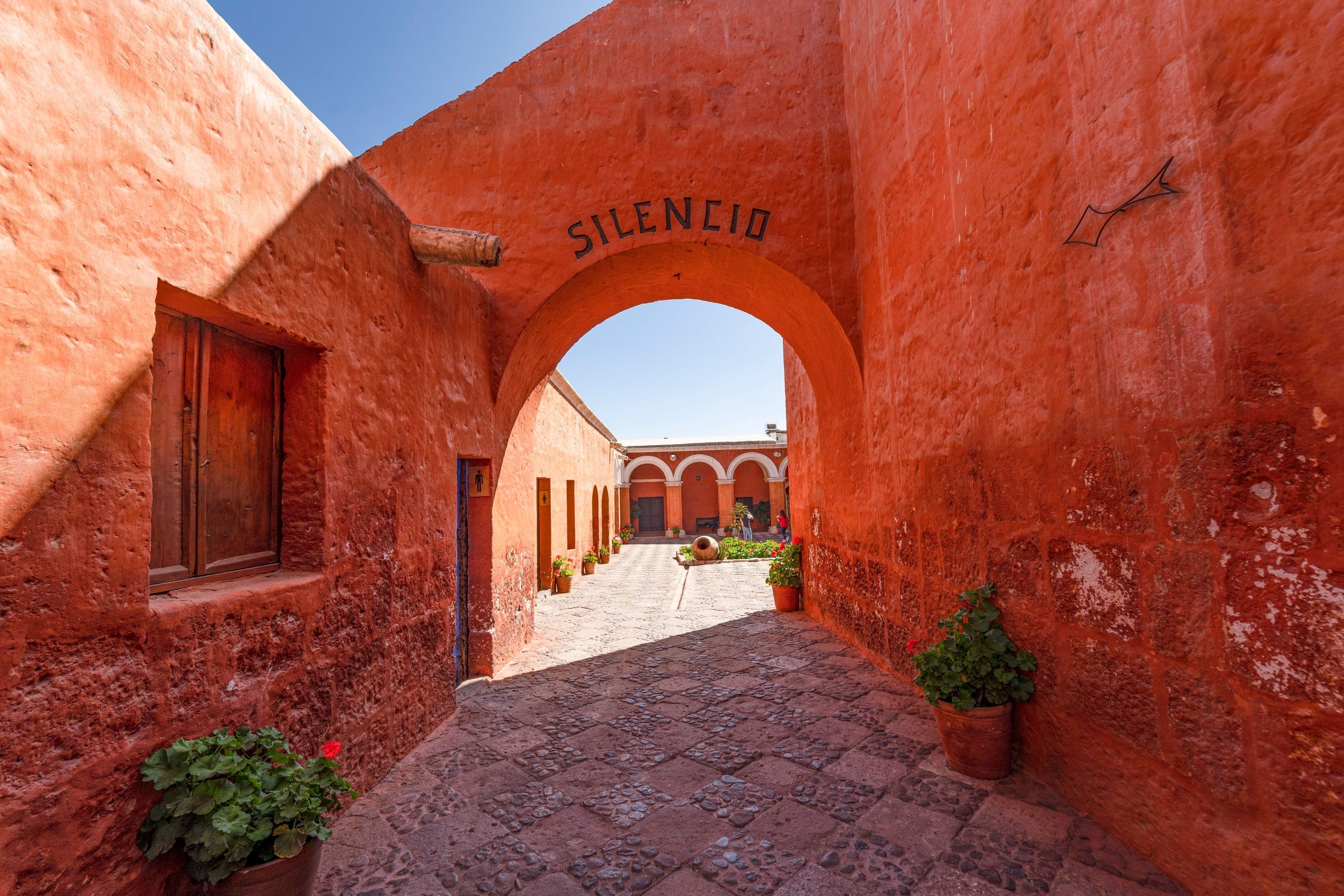 Santa Catalina Monastery: A Bare Wall and the Town Inside