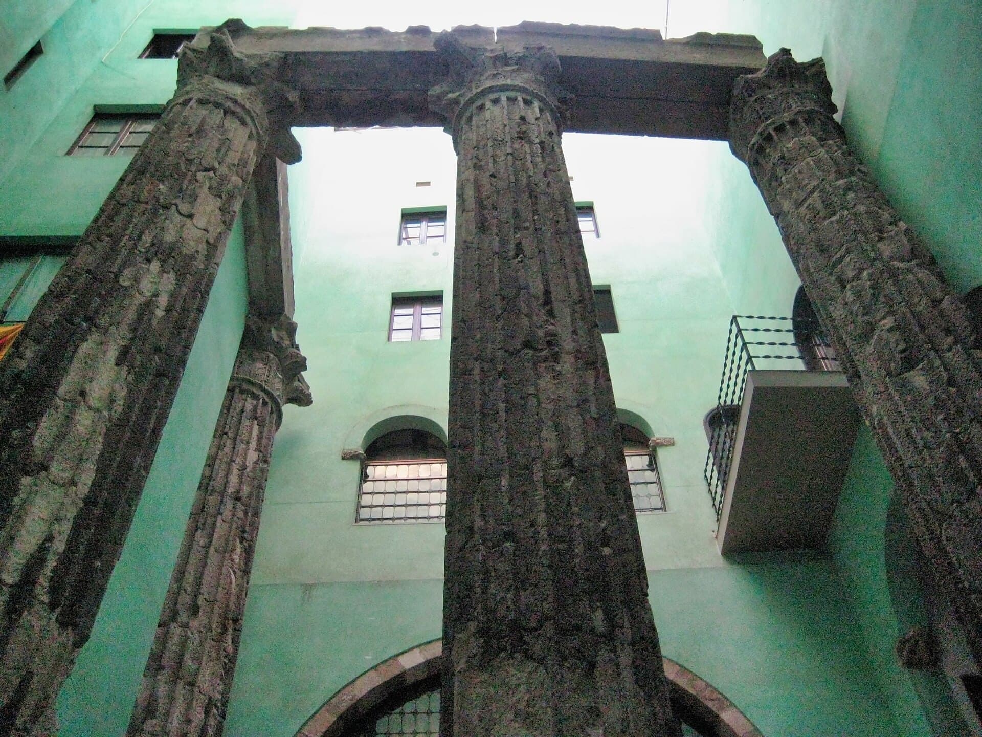 The Temple of Augustus: Roman Columns Behind a Gothic Quarter Door