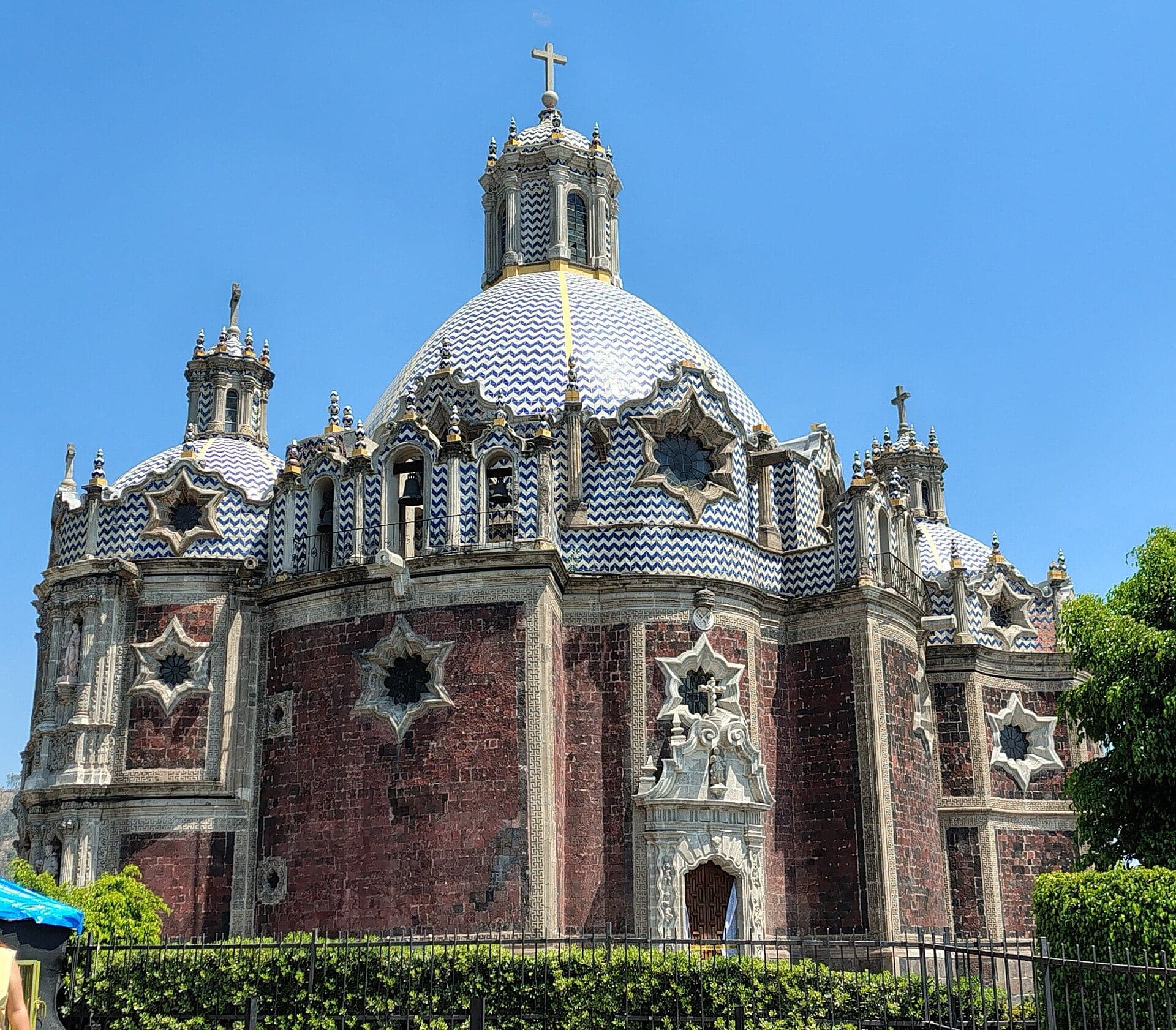 Capilla del Pocito: Red Stone Under Tiled Domes